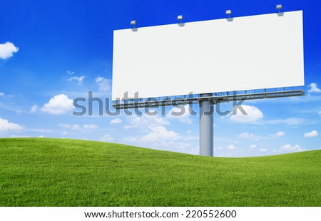 large commercial sign on the hill