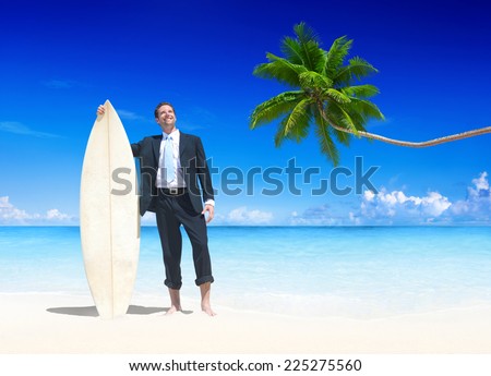 Businessman with surfboard on the beach.