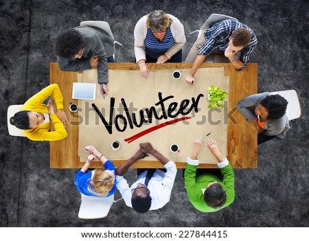 People in a Meeting and Single Word Volunteer