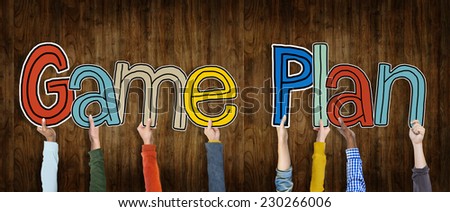Diverse Hands Holding the Words Game Plan