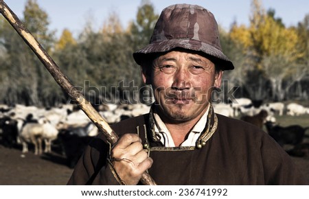 Portrait of mongolian man famer.
