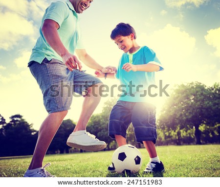 Family Father Son Playing Football Summer Concept