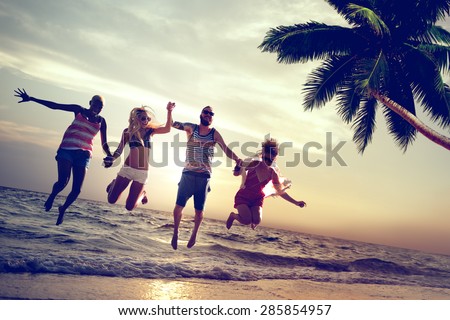 Diverse Beach Summer Friends Fun Jump Shot Concept