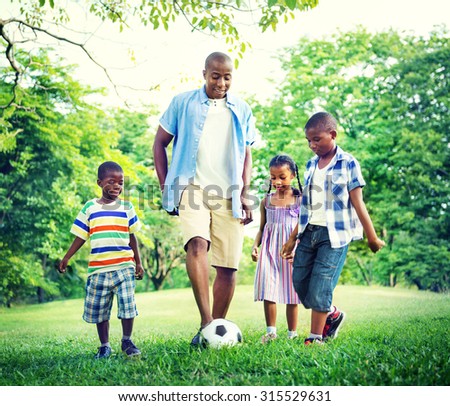 Family Bonding Recreation Sports Football Concept