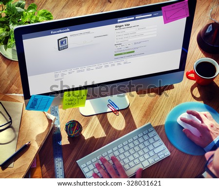 Bangkok, Thailand - October 14, 2015: Man Using Computer Browsing Facebook Website