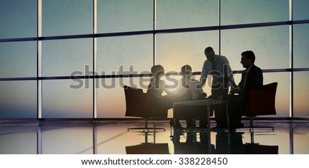 Group of Business People Meeting in Back Lit Concept