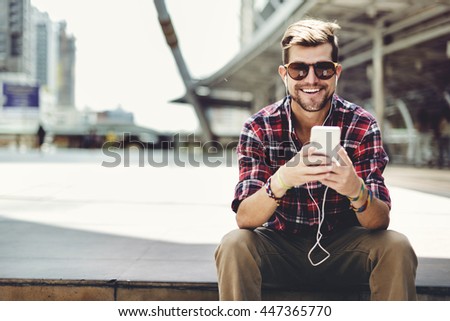 Man Sitting Listening Music Earphones Concept
