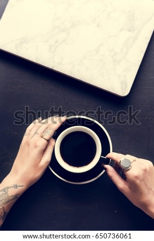 Tattoo Hands with Coffee Cup Beverage