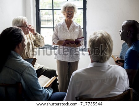 Group of christianity people reading bible together