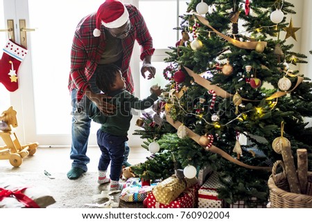 Black family enjoying Christmas holdiay