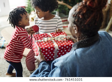 Black family enjoying Christmas holdiay