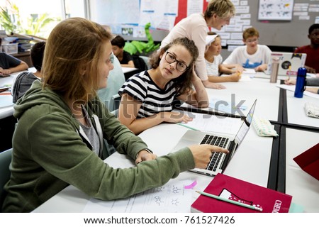 Group of students learning in a classroom