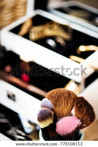 Closeup of woman's makeup box