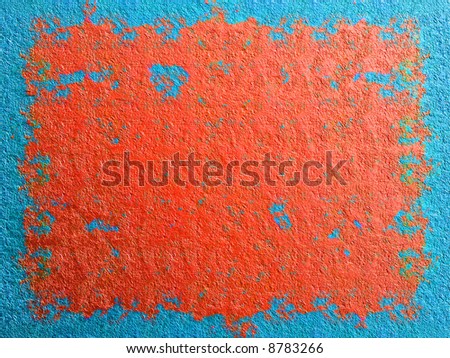 Red paint scratched from a blue painted metallic background
