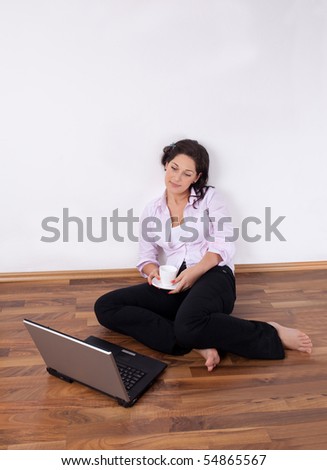 Young woman barefoot relaxed on the floor
