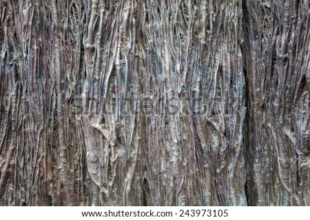 Old wood rind texture background made of metallic bronze