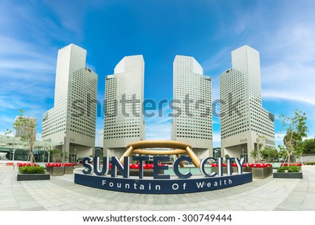 SINGAPORE-FEB 2, 2015 : Panorama of Suntec City Towers 1,2,3,4 with Fountain of Wealth in the foreground.it is located in the commercial complex of Suntec City, Singapore.