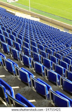 Blue seats on stadium (free before football match)
