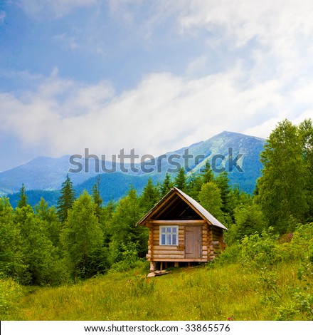 landscape with wooden house in mountains