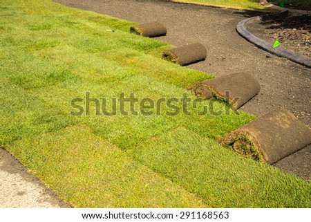 Installation of sod on private property front lawn