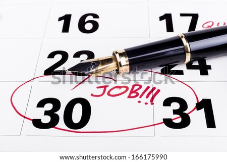 Calendar with marked with red fountain pen on the 30-th for job fining deadline