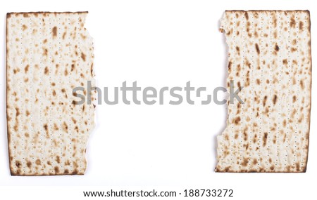 Broken in half Jewish traditional Pesach textured Matza bread substitute isolated on white background