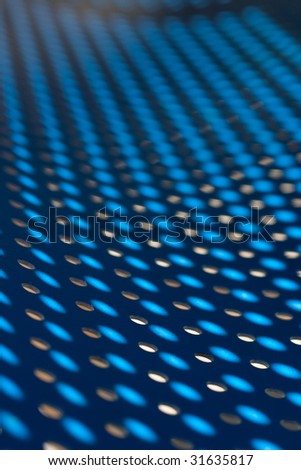 blue background with holes and light dots
