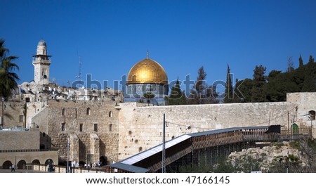 jerusalem western wall and golden mosque blue sky
