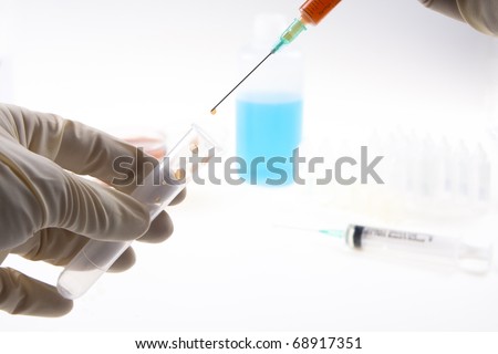 blood sample transfer from syringe to a plastic tube
