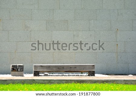 concrete wall and bench