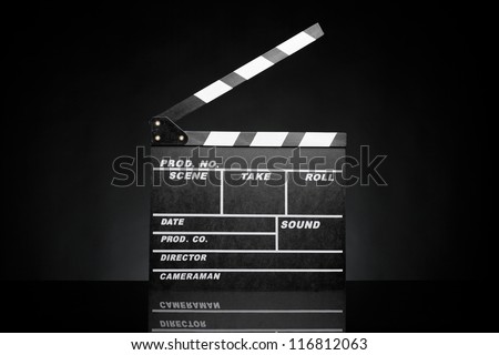 Open film slate (clapboard) against black background