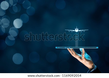 Air ticket booking on digital tablet app or online travel insurance concepts. Person with digital tablet and symbol of a plane.