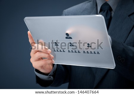 Human resources and corporate hierarchy concept recruiter complete team by one leader person CEO represented by icon on futuristic glass tablet Human resources and corporate hierarchy concept recruiter complete team by one leader person CEO represented by icon on futuristic glass tablet