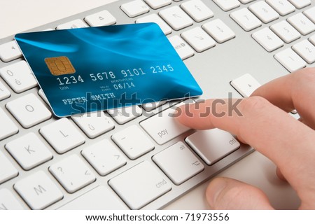 Keyboard with button pay and credit card - payment concept I am author of image used on credit card and used data are fictitious.
