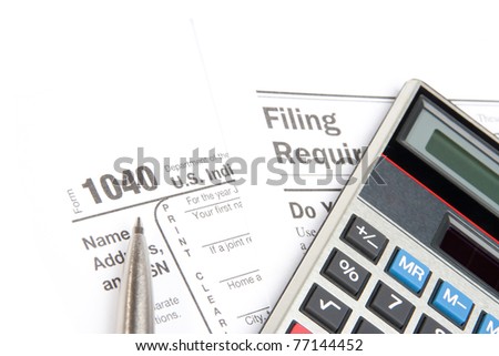 Tax form, filing requirement, calculator, and pen