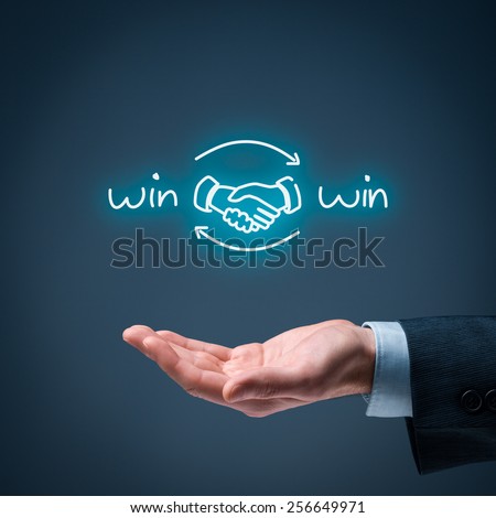 Win-win partnership strategy concept. Businessman offer win-win scheme with handshake partnership agreement.