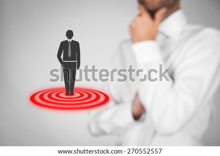 Target customer (marketing) concept. Businessman think about target customer represented by virtual icon of man standing on target.