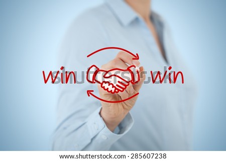 Win-win partnership strategy concept. Businesswoman draw win-win scheme with handshake partnership agreement.