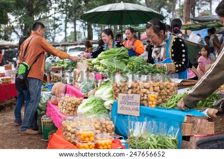 CHIANGMAI, THAILAND - JANUARY 18 : Unidentified minority selling stuffs in traditional tribal market in tribe minority village on January 18, 2015 in Chiangmai, Thailand.