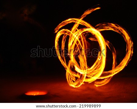 Fire Dancer on a Beach