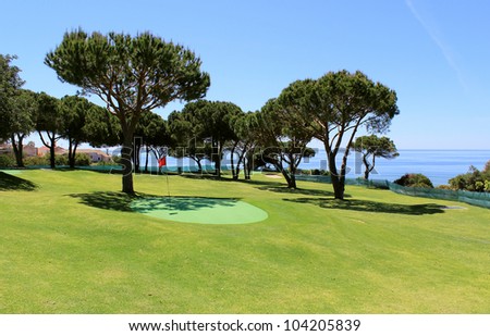 Training golf course in the Algarve coastline landscape. Portugal