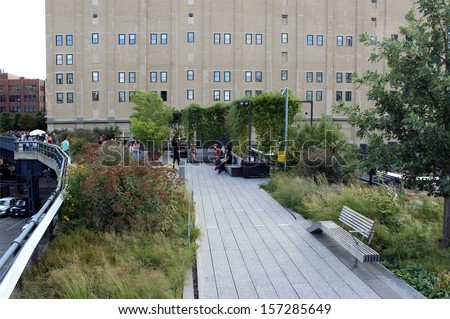 NEW YORK CITY - SEPTEMBER 03: People at High Line Park in NYC on September 03th, 2013. High Line is a public park built on an historic rail line elevated above the streets on Manhattan West Side.