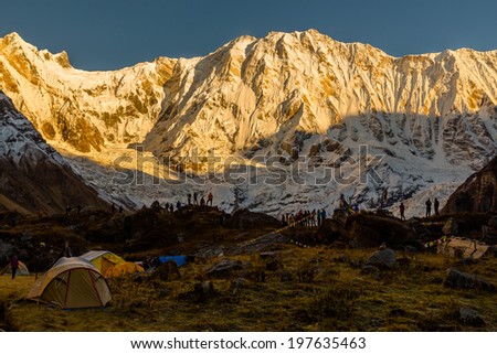 People Watching Sunrise at the Annapurna Base Camp 4180m in Himalayas, Nepal