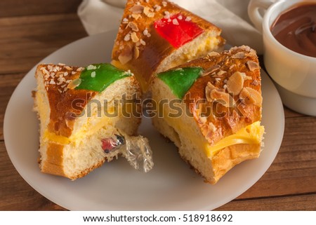 Pieces of Kings cake (Roscon de Reyes) served with a surprise inside