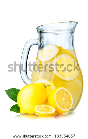 Lemonade pitcher with lemon slices and ice cubes isolated on white