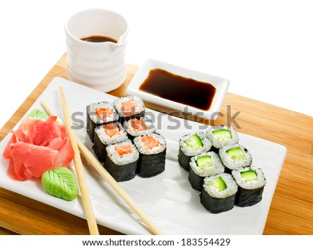 Sushi rolls with soy sauce and chopsticks