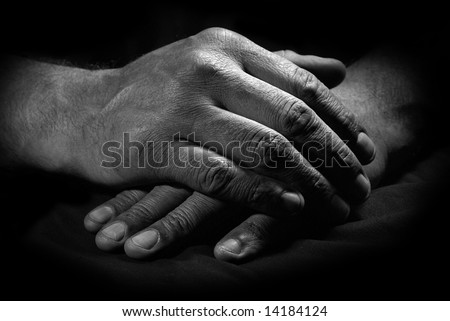 Black and white crossed hands of the man