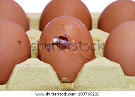 Detail of a carton packaging with a broken egg