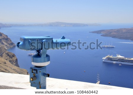 Touristic binoculars in blue. Optical instrument for magnify views