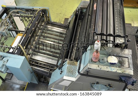 Top view of an old printing press. This machine uses offset technology for printing